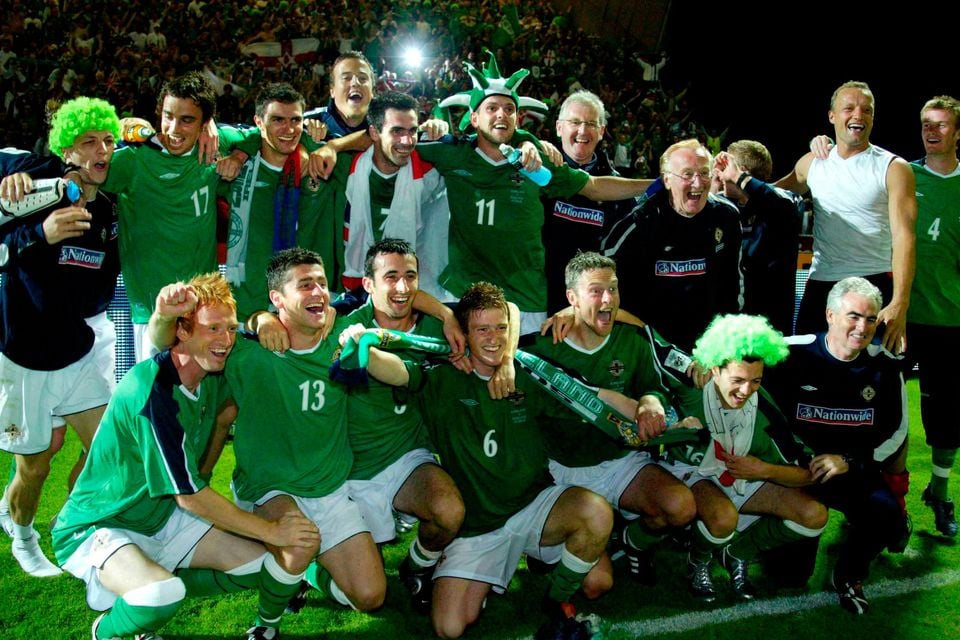 Northern Ireland players and staff celebrate their 2005 win over England